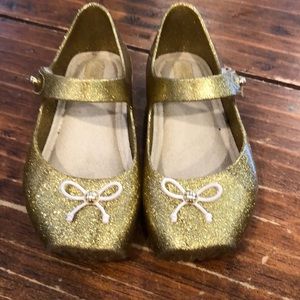 Mini Melissa gold sparkle shoes